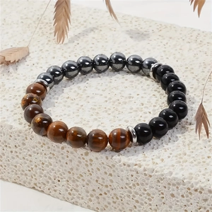 Bracelet triple protection avec perles oeil de tigre, hématite et obsidienne sur pierre