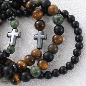 Bracelet perlé avec œil de tigre, pierre de lave noire et pendentif croix en acier