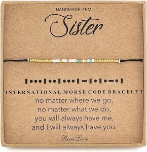 Detail of Morse code bracelet on 'Sister' gift card with turquoise and gold beads