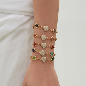 Five-piece gold-plated bracelet set with colorful round gemstones and pavé crystals
