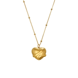 Elegant gold heart pendant necklace with pleated texture and beaded stainless steel chain