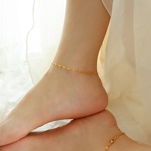 Minimalist 18K gold plated fish mouth chain anklet worn on ankle for summer beach style