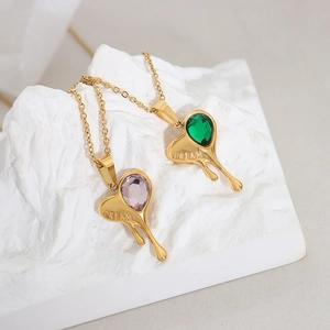 Lava heart necklaces with crystal water drops and DREAM engraving in gold finish