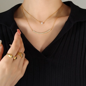 Double-layer gold stainless steel necklace with smile zircon pendant and matching rings