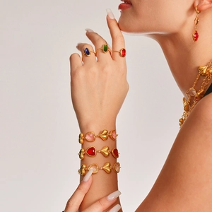 Luxury heart-shaped crystal jewelry set in stainless steel featuring necklaces and bracelets