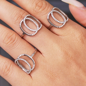 Three-piece set of silver double oval zircon rings with intertwined geometric design