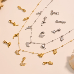 Marine dolphin pendant necklace in 18k gold plating featuring sparkling zircon accents