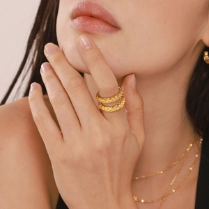 Minimalist 18k gold plated stainless steel irregular lava texture ring on model