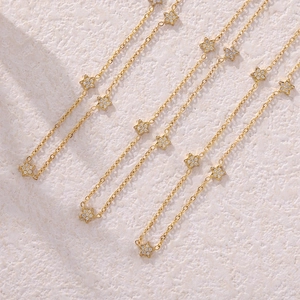 Collier double couche en titane doré avec pendentifs étoiles en zircon pour femmes