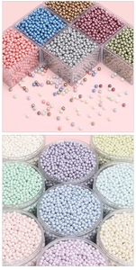 Close-up of 4mm pearl glass beads in pastel colors for DIY jewelry making sets