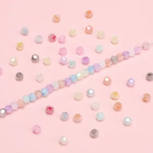 Macro display of faceted macaron glass beads for DIY jewelry making and necklaces