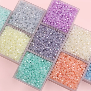 Colorful faceted glass seed beads in pastel macaron tones for DIY jewelry making