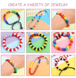 Macro view of colorful DIY bead jewelry sets featuring rainbow charms and letter beads