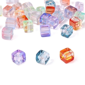 Macro shot of colorful cube glass beads with aurora finish and precise holes for DIY jewelry