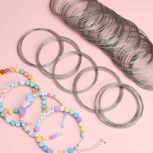 Macro shot of silver plated memory wire loops for DIY handmade bracelet jewelry making