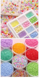 Macro shot of colorful acrylic peanut beads for DIY jewelry making in a storage box