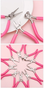 Macro shot and collection of pink handle jewelry pliers for DIY handmade crafts