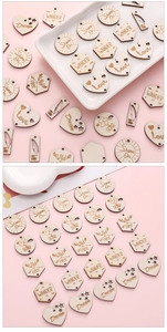 Detailed laser-engraved wooden charms in heart and round shapes for DIY craft making