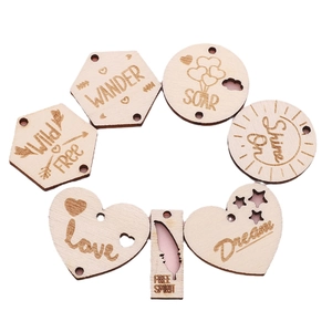 Handmade laser-engraved wooden pendants in heart and geometric shapes for DIY crafts