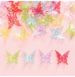 Macro view of translucent 25mm colorful butterfly beads with detailed wing textures