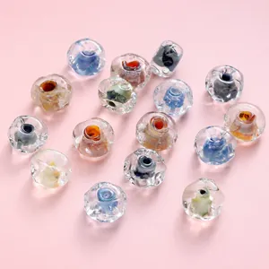 Close-up of 12x7mm wave pattern glass beads with colorful cores for DIY jewelry