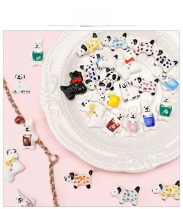 Detailed view of colorful polka dot ceramic dog and bear beads for DIY jewelry