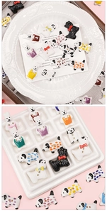 Detail view of hand-painted baroque ceramic puppy dog beads for DIY jewelry making