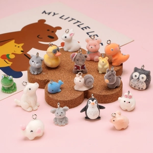 Variety of mini flocked animal charms with metal rings for DIY jewelry and phone accessories