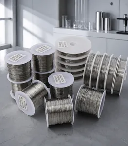 Multiple spools of silver stainless steel beading wire showing various sizes and lengths