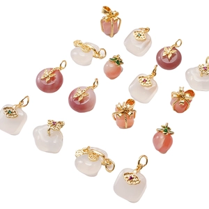 Various 14K gold butterfly and fortune bag pendants with pink jade for DIY jewelry