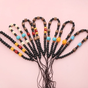 Braided wenge wood handle rope with colorful beads and dark brown tassels