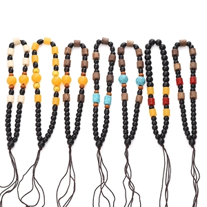Set of seven handcrafted ethnic style beaded wooden ropes for DIY pendants and crafts