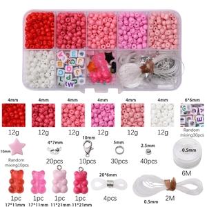 Detail view of 10-grid DIY bead kit with charms, letter beads, and elastic strings