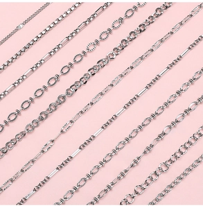 Close-up of various silver stainless steel DIY jewelry chains in different styles