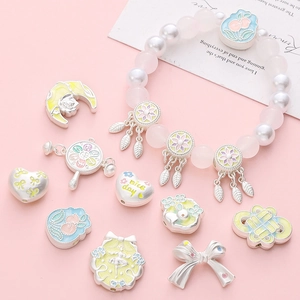 DIY charm jewelry set with pastel beads and alloy pendants for bracelets and necklaces