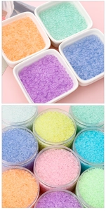 Macro shot of colorful small frosted glass beads for DIY jewelry and crafting