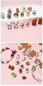 Macro shot of assorted ceramic animal beads for DIY jewelry making with smooth finish
