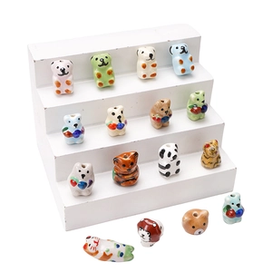 Hand-painted ceramic animal beads including panda and frog for DIY jewelry making