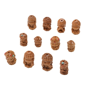 Handcrafted wooden micro-carving beads for DIY bracelets featuring Zen monk and Guanyin motifs