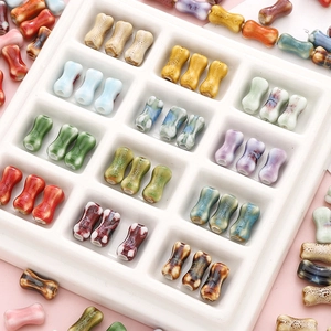 Handmade bone-shaped ceramic beads in various kiln-glazed colors for DIY jewelry making