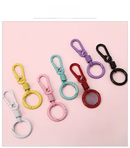 Macro view of colorful spring-loaded lacquer keychains in various pastel macarons colors