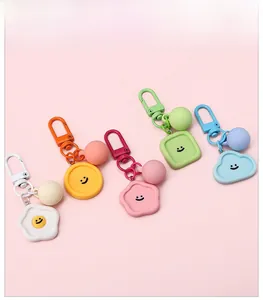 Detailed group view of pastel macaron-colored resin charms with minimalist smiley faces