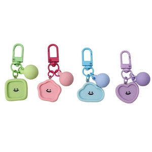 Macaron pastel resin smiley face charms with cloud and heart shapes on keychains