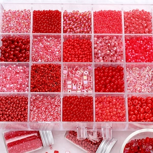 DIY jewelry kit with red glass beads in a 20-grid organizer for bracelets and necklaces