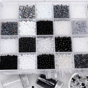 Detailed view of 20-grid organizer box with dark-themed DIY glass seed beads and glass vials