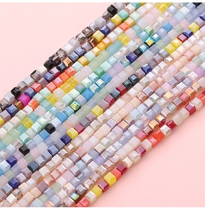 Macro shot of 2mm square faceted colorful glass beads for DIY jewelry making