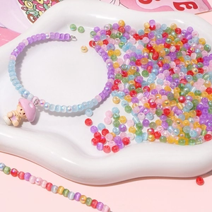 Vibrant 4mm aurora cat eye glass beads for DIY jewelry with a cute mushroom charm