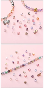 Makroansicht von 4mm Bicone-Kristallperlen mit Regenbogeneffekt und Herzanhängern für DIY