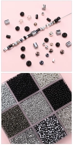DIY black and silver glass seed bead set in a 9-grid clear storage organizer box