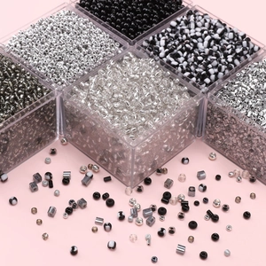 DIY black glass seed beads set with round and tube shapes for handmade jewelry